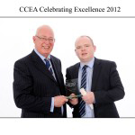 CCEA Chief Executive Gavin Boyd congratulates Rory Farren