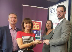 First Trust, Denise Black, HR Business Partner (receiving award) Gary McMurray and Sinead McArt