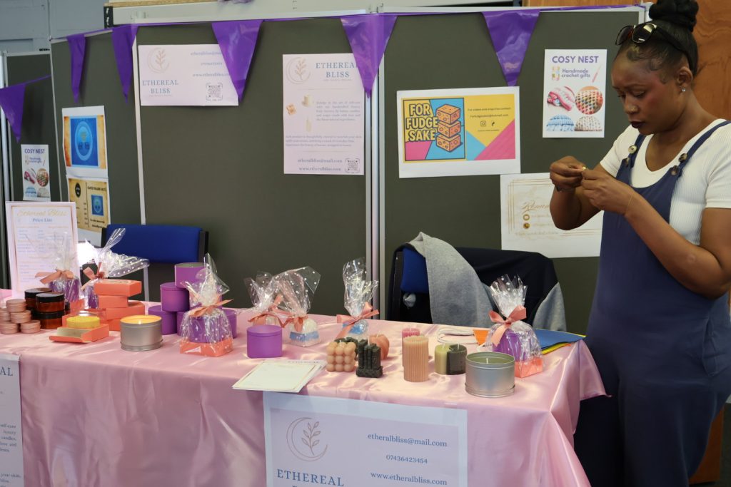 Action Mental Health SkillSET client, Maria, at her business stall.