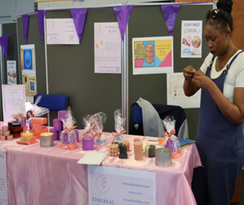 Maria at a stall representing her skincare business.