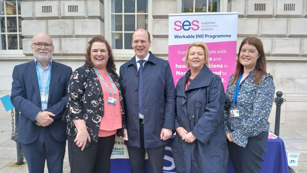Staff from Cedar Foundation, Action Mental Health, and Department for Communities, with Communities Minister at the Annual Big Lunch event.